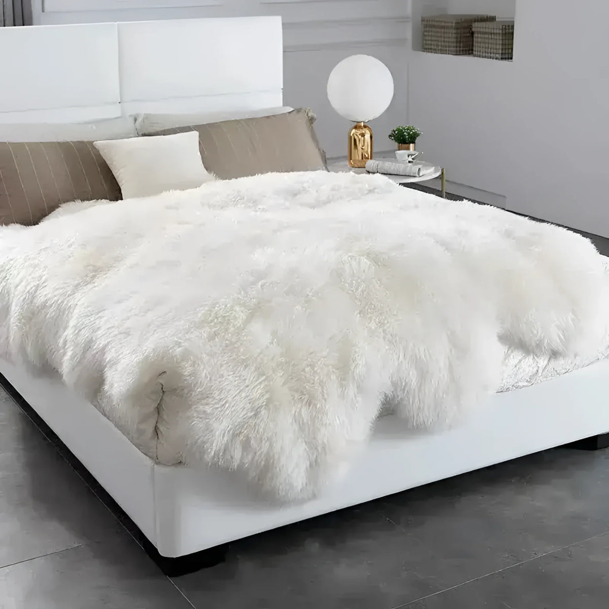 Luxurious Genuine Sheepskin Wool Area Rug draped over a modern bed, adding a plush and cozy touch to the bedroom setting, perfect for enhancing any living room area rugs collection.