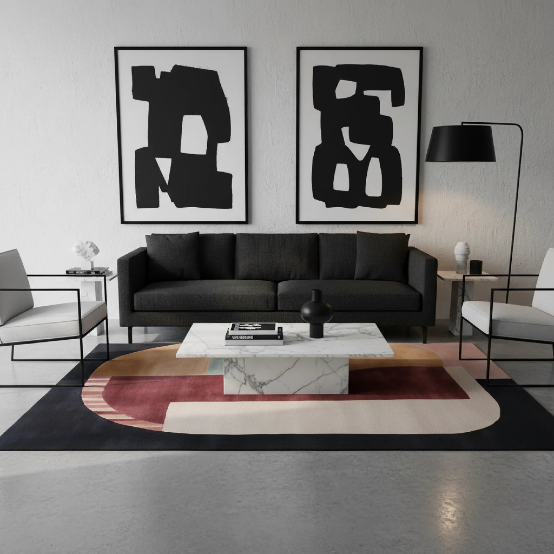 Modern living room with black sofa, abstract art, and geometric rug.
