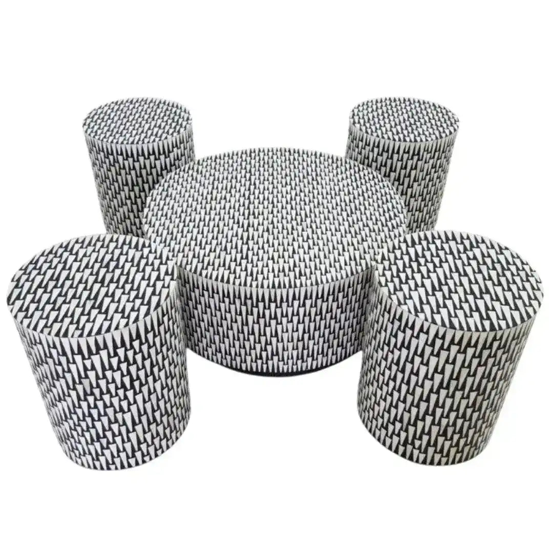 Geometric Harmony bone inlay round coffee table with four matching cylindrical ottomans; black and white geometric inlay pattern
