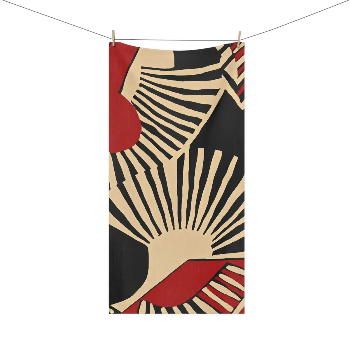 Geometric Mid-Century Modern Bath Towel corner detail, folded edge showing dark abstract graphic face print and grey backing with stitched hem