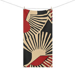Geometric Mid-Century Modern Bath Towel corner detail, folded edge showing dark abstract graphic face print and grey backing with stitched hem