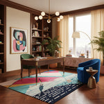 Modern home office with a colorful rug, bookshelf, and desk.