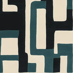 Contemporary area rug with a geometric pattern in black, teal, and cream colors, showcasing a modern abstract design. Ideal wool rug for living rooms seeking a stylish and artistic touch.