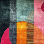 A vibrant geometric tapestry hand-tufted wool rug, perfect as a large area rug for the living room. This contemporary rug features bold colors and abstract shapes, ideal for adding a modern touch to your living space. The rug's 8x10 size makes it an excellent choice for area rugs in the living room, combining style and comfort with its wool texture.