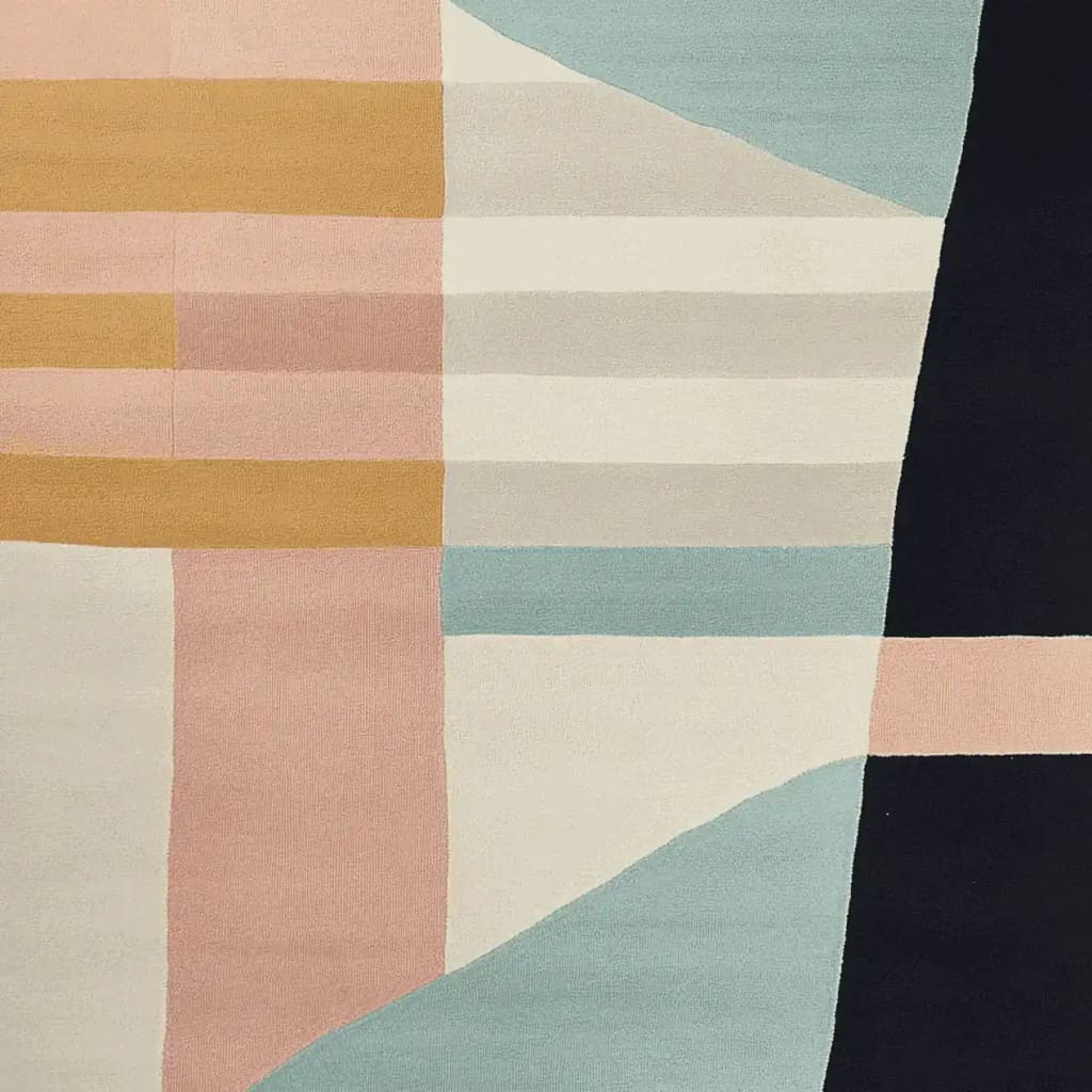 A stunning, contemporary area rug featuring an abstract geometric design in pastel shades of pink, blue, beige, and black. Perfect for large living rooms, this hand-tufted wool rug adds a modern touch to any space.