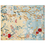 Top view of a Gilded Bloom Breeze Hand Tufted Area Rug, showcasing an elegant floral design with vibrant red and white blossoms on a background of soft blue and beige hues. This wool rug adds a touch of sophistication to large living room spaces.