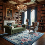 Luxurious living room with green sofa, patterned armchair, and bookshelves.