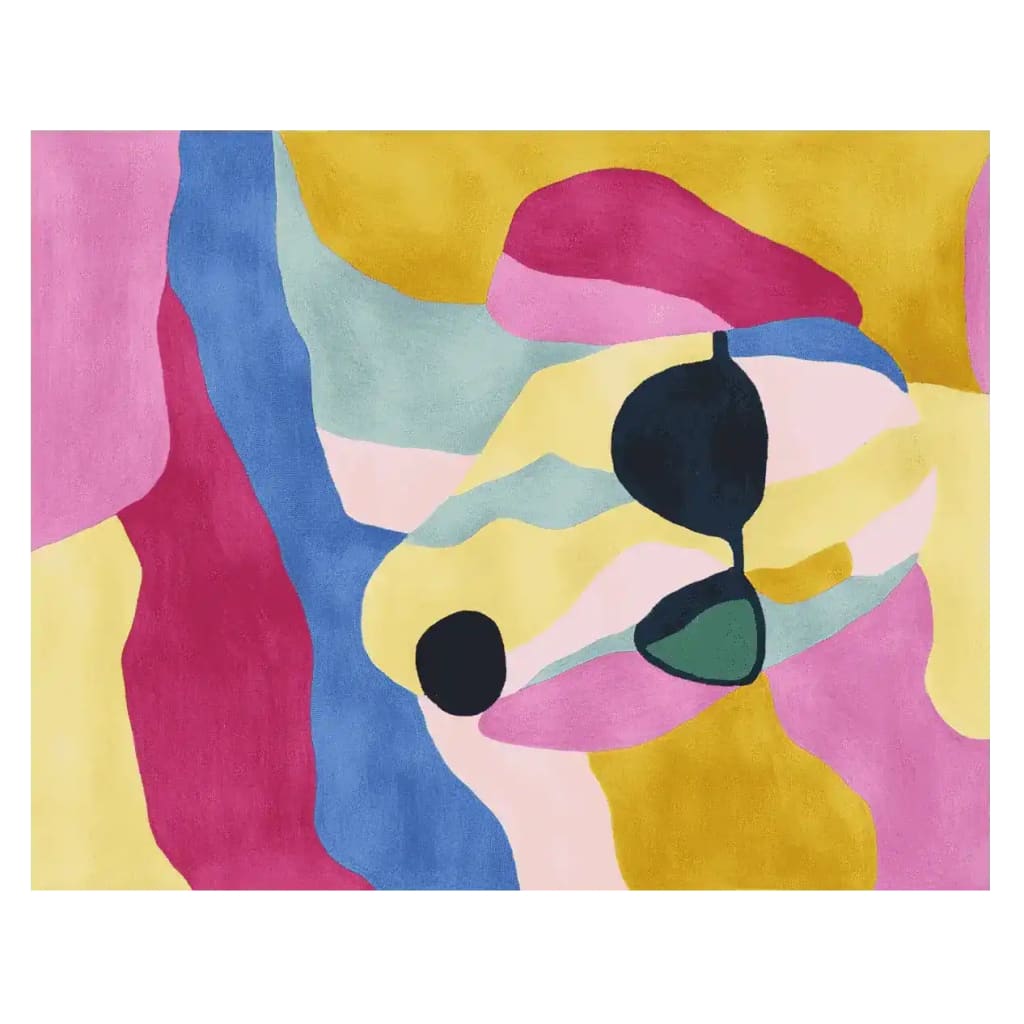 A vibrant Glam Pup Mood Hand Tufted Rug featuring an abstract design with bold colors like pink, blue, yellow, and black. This contemporary area rug is perfect for adding a pop of color to a living room. Made from high-quality wool, it's a stylish and durable choice for any home decor.