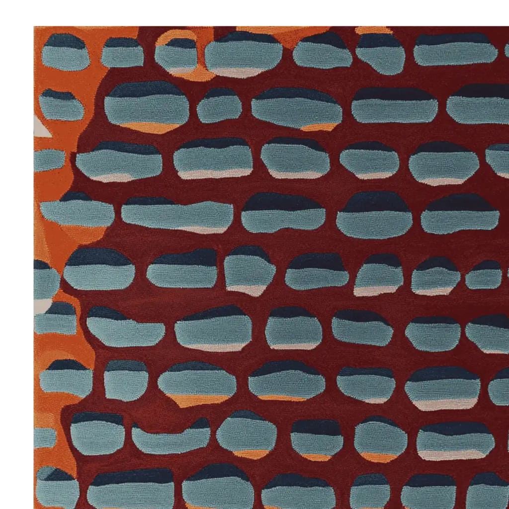 Contemporary area rug in an abstract pattern of blue and orange shapes on a deep red background. Perfect wool rug for living room settings, sized 8x10, adding a modern touch to your decor.
