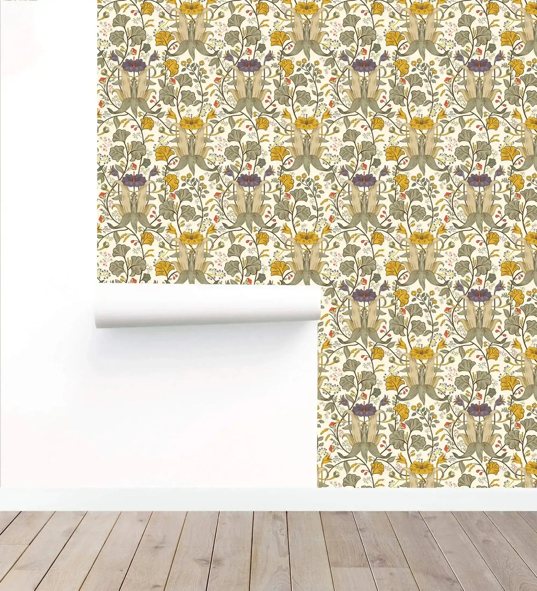 Roll of golden blooms floral wallpaper partially unrolled against a white wall on a bare wood floor