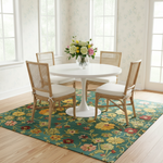 Dining set on golden blossom Persian rug, teal field with yellow and gold floral border