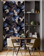 Golden crane flight wallpaper feature wall, white cranes and blue peonies on navy beside a dining table