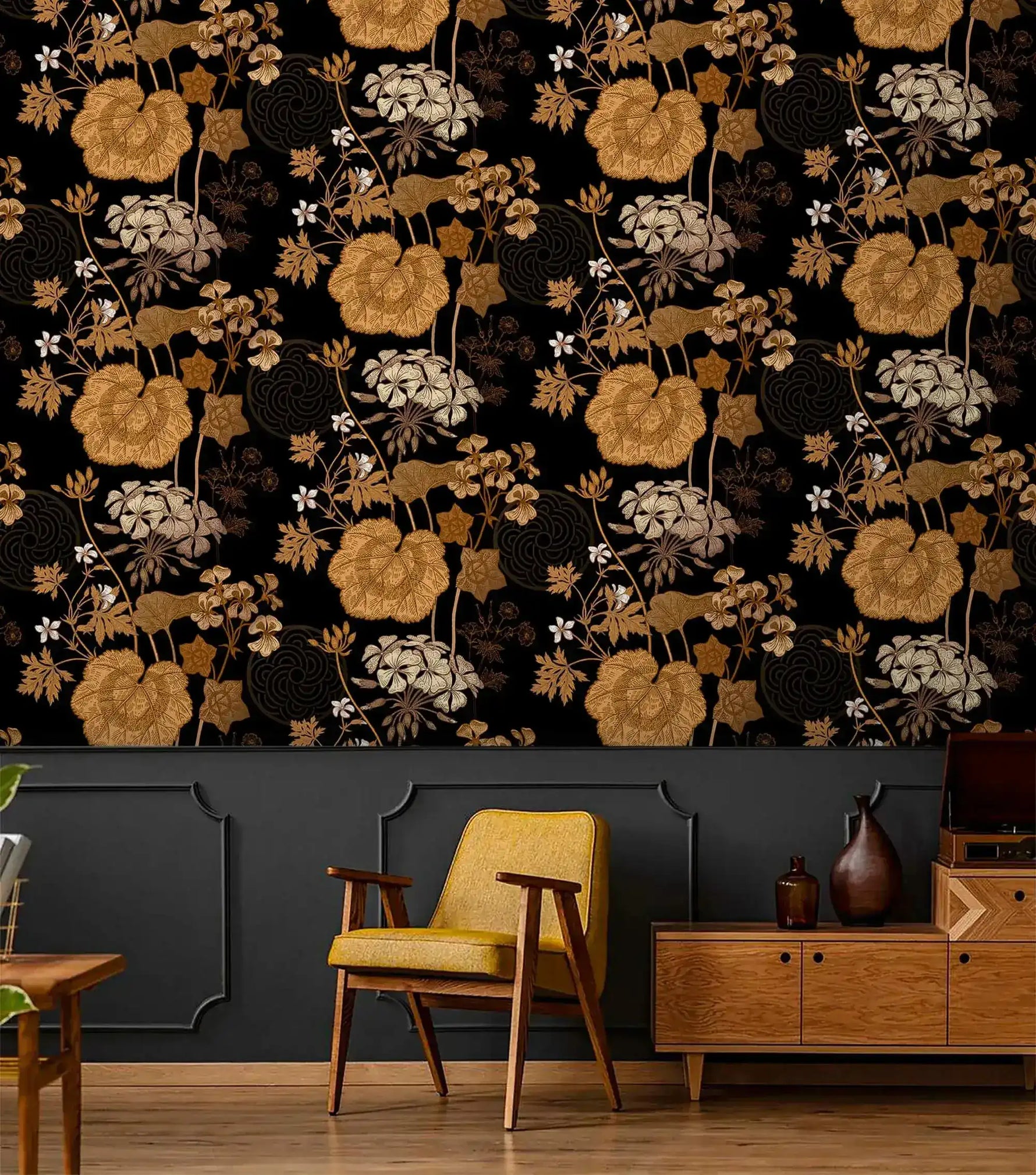 Yellow chair and wood credenza against golden creeper vine wallpaper above dark wainscoting