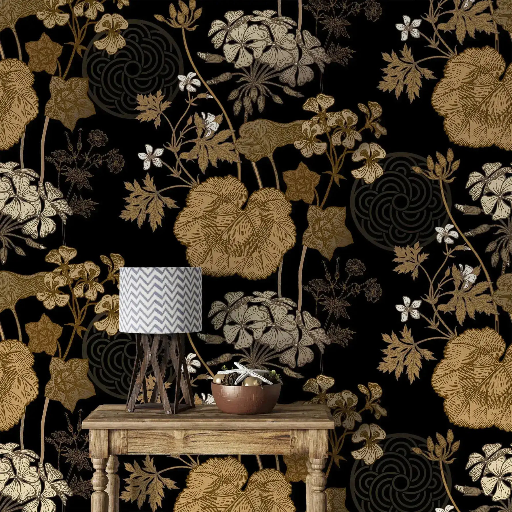 Console table with lamp against golden creeper vine wallpaper, gold blooms on black
