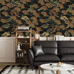 Golden dragon waves wallpaper above white wainscot in lounge with black leather sofa and record player