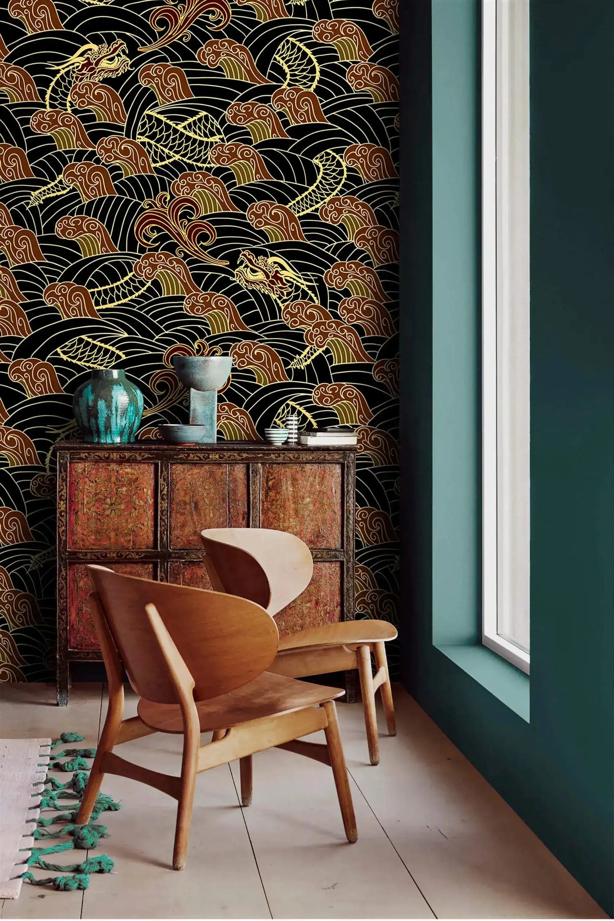 Golden dragon waves wallpaper accent wall with wood chairs, carved cabinet and teal vases by window