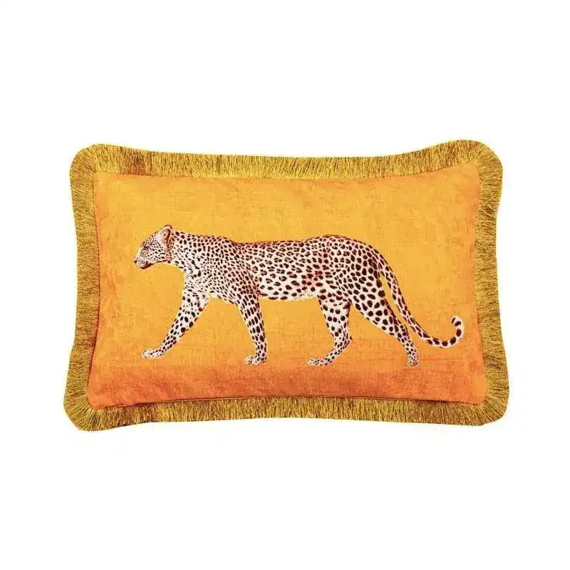 Golden fringe leopard throw pillow cover featuring a striking leopard design on an orange background.