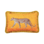 Golden fringe leopard throw pillow cover featuring a striking leopard design on an orange background.