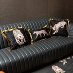 Golden fringe leopard throw pillow cover displayed on a modern sofa, featuring intricate leopard designs.