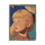 Golden Gaze Surreal Portrait woven blanket portrait, golden-haired child close-up on cobalt blue with floating fish and fringe border
