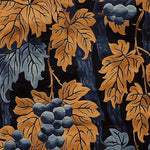 A close-up of the Golden Harvest Hand Tufted Area Rug, showcasing intricate vintage design with golden and blue foliage patterns. This wool rug is perfect for adding a touch of elegance to living room spaces, available in an 8x10 size.