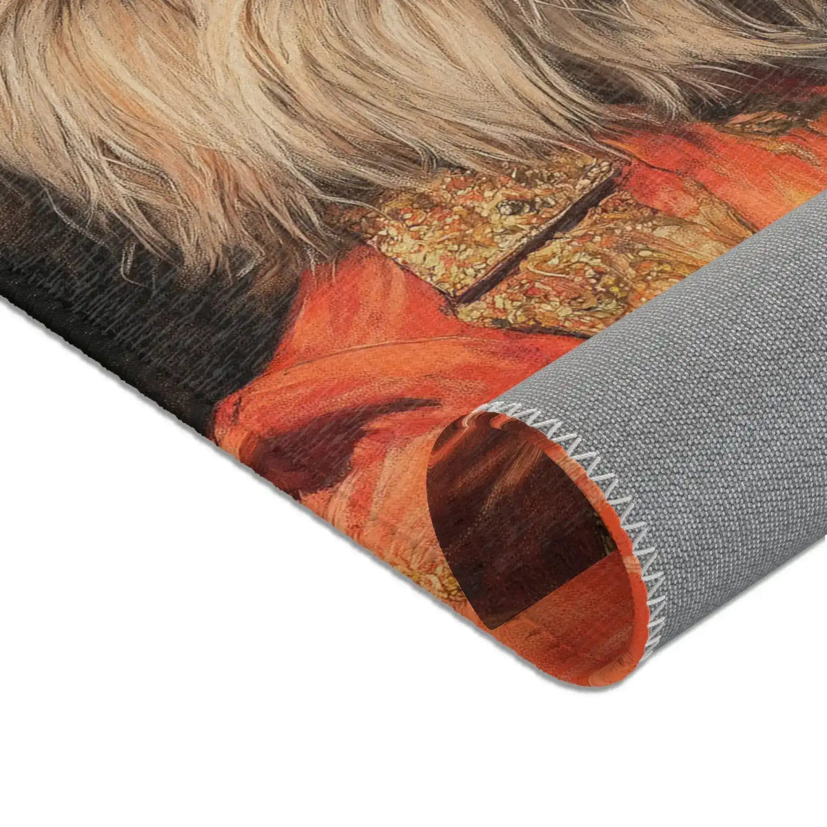 Rolled corner detail of the Golden Majesty Luxe Lion Accent Rug showing cream lion mane, gold-trimmed red jacket and grey non-slip backing