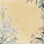 Golden Meadow Hand Tufted Area Rug featuring delicate floral patterns on a soft yellow background. This wool rug is an elegant choice for large living room spaces, adding a touch of nature-inspired beauty to any setting. Ideal for those seeking stylish rugs for living room decor.