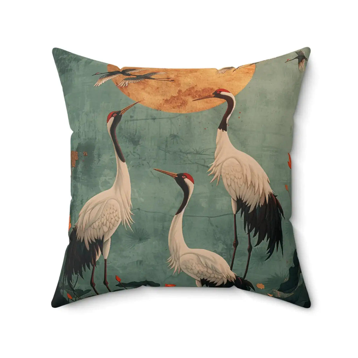 Golden Moon & Crane Serenity Pillow shown in-room with abstract warm crimson-coral-teal rug under a dark desk and arched window with brown curtains