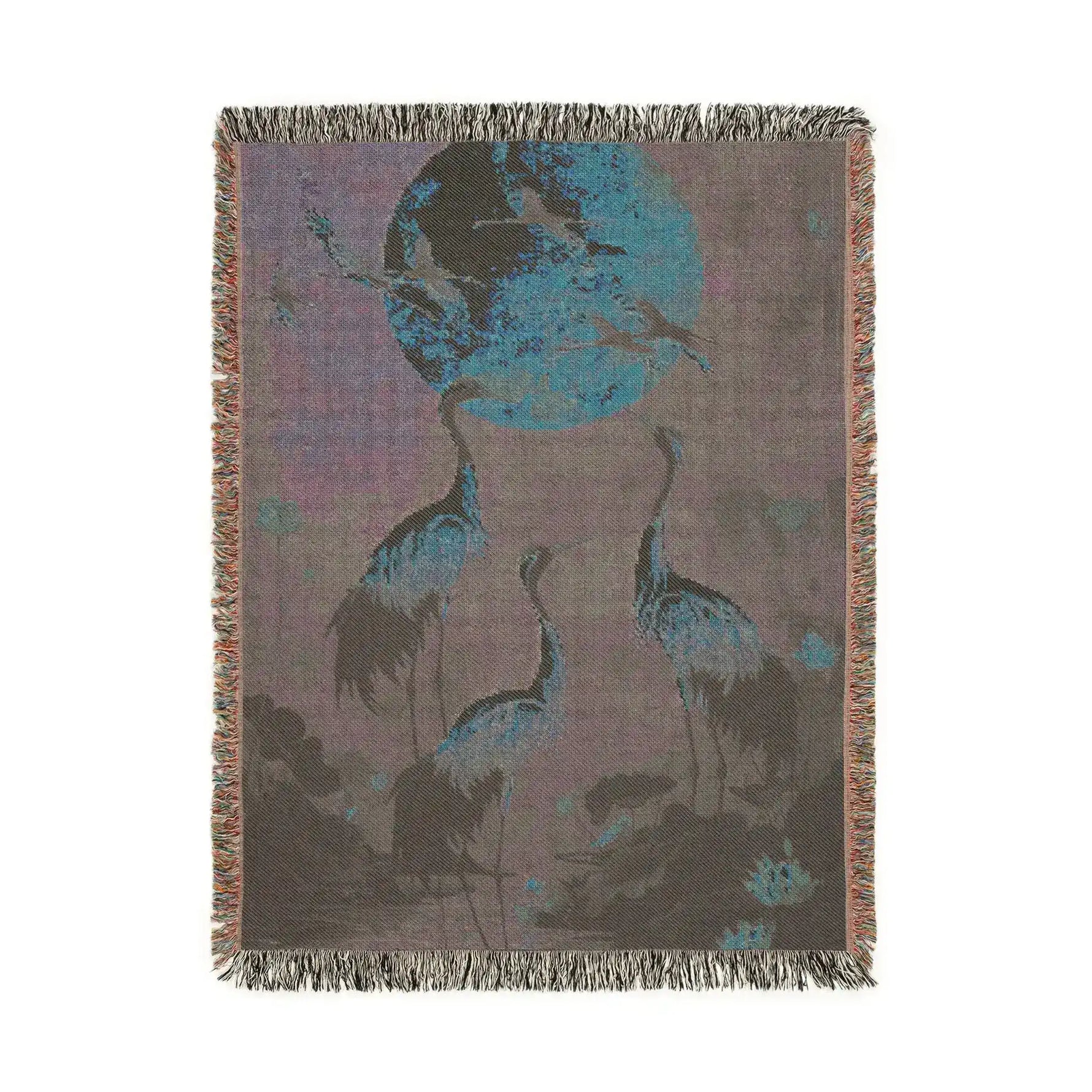 Golden Serenity Cranes at Dusk Woven Blanket reverse view with muted teal cranes and blue moon on dusty mauve ground, fringe border