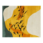 A vibrant area rug featuring a hand-tufted design with a mix of golden, black, and earthy tones, showcasing an abstract pattern reminiscent of birds in flight. This wool rug is perfect for contemporary home decor, especially as an eye-catching area rug for living rooms.