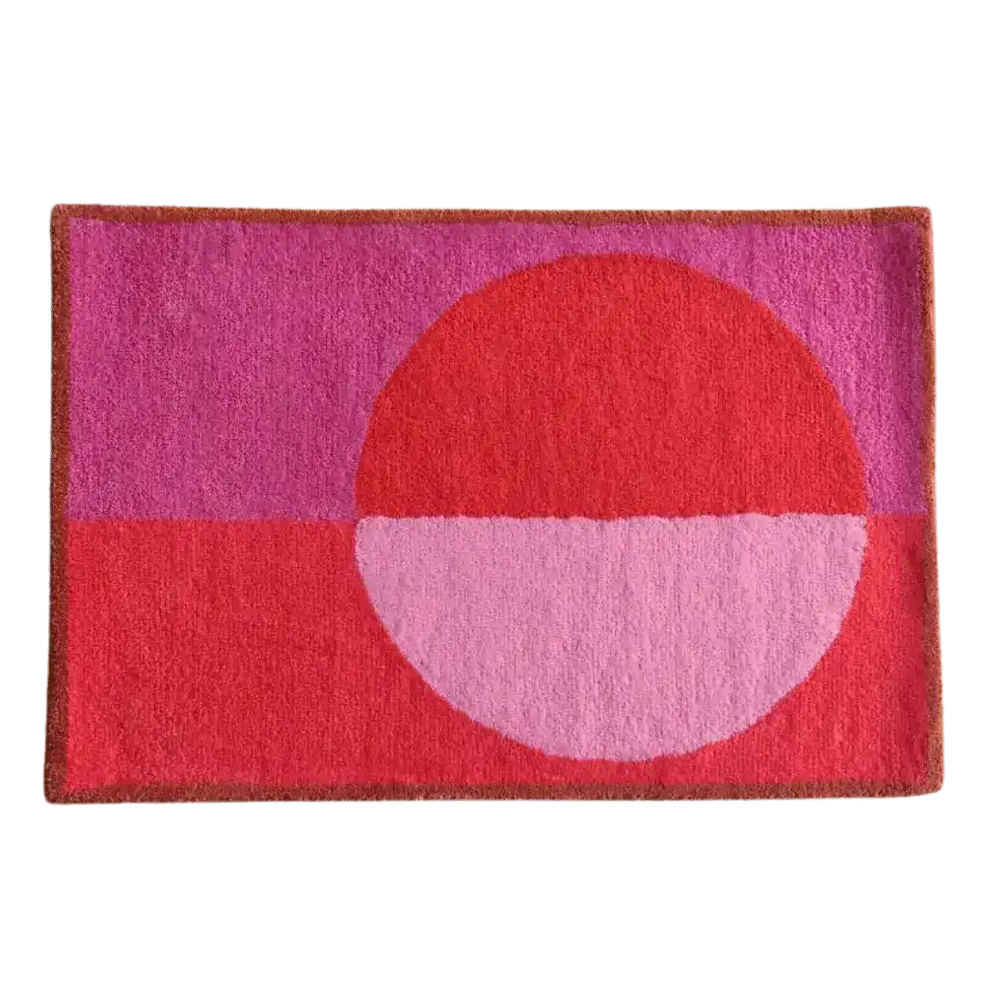A stylish area rug featuring a minimalist geometric design with a golden trim. The hand-tufted wool rug displays a vibrant pink and red pattern, perfect for adding a vintage touch to your living room. Ideal for living room rugs 8x10 dimensions.