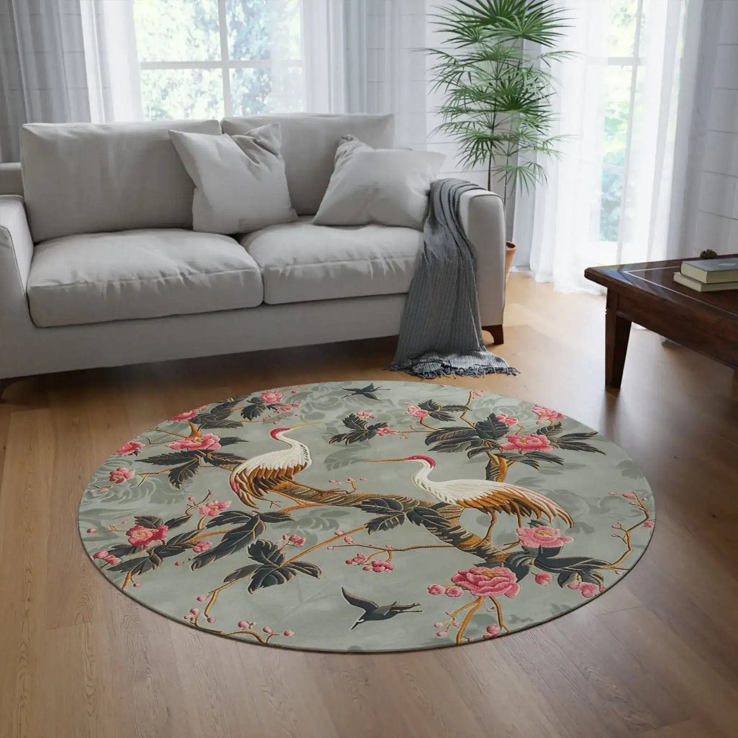 Graceful Crane and Blossom Pattern Round Rug in a neutral room with cream and sage decor, crane-and-peony chinoiserie design