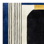 Close-up view of the Graphic Stripe Dream Hand Tufted Area Rug showcasing its contemporary design. The wool rug features a bold mix of black, white, blue, and gold colors with abstract stripes, perfect for large living room spaces. Ideal as a living room rug in an 8x10 size.