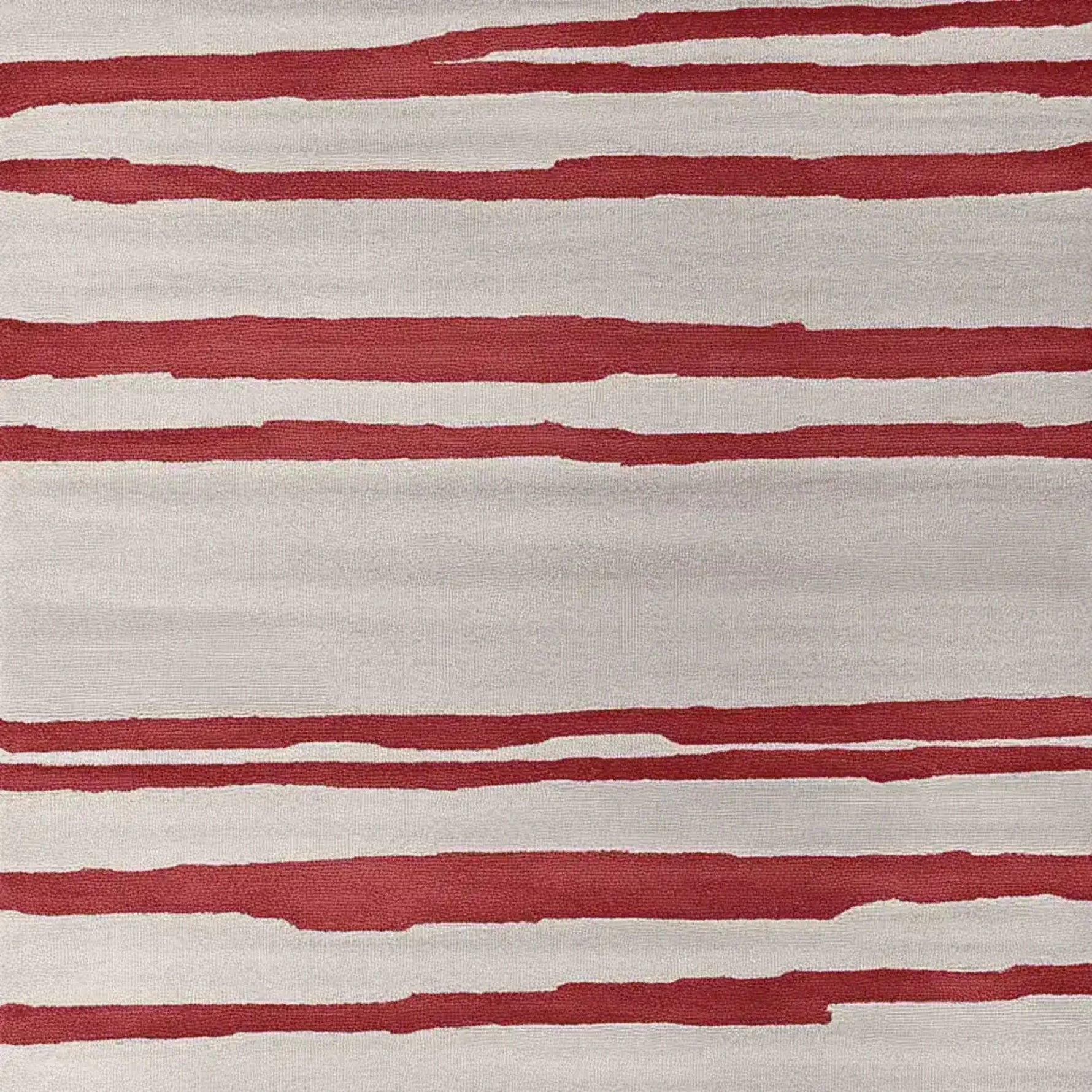 A contemporary area rug featuring bold red and cream stripes, perfect for a stylish living room. This hand-tufted wool rug adds a modern touch to large living room spaces, making it an ideal choice for those seeking high-quality rugs for living room decor.