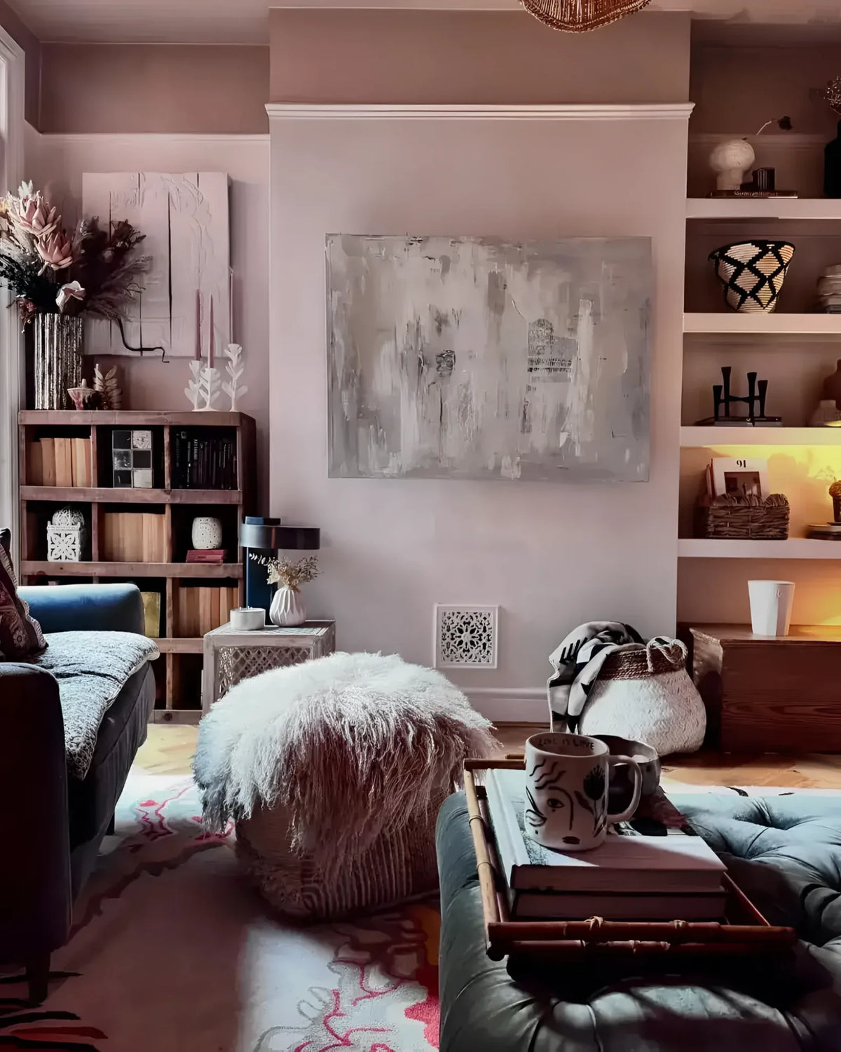 A cozy living room featuring a Grassy Knoll Hand Tufted Area Rug with a vintage design. The wool rug adds a touch of contemporary elegance, perfect for both living room and bedroom settings. Surrounded by stylish decor, the rug complements the soft furnishings and neutral palette, making it an ideal choice for bedroom rugs and living room area rugs.