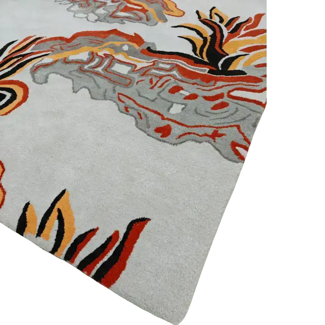 Vibrant contemporary area rug with abstract patterns in orange, red, and black on a light grey background. Perfect for adding a touch of vintage charm to a bedroom or living room setting, this wool rug offers a stylish and colorful accent to any space.