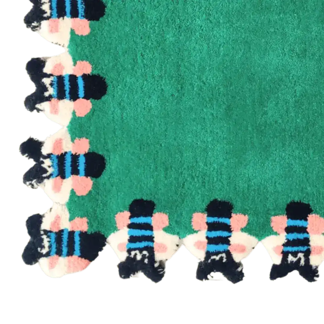 A vibrant hand tufted wool area rug featuring a playful bee pattern along the border on a rich green backdrop. This unique design adds a whimsical touch to any living room or bedroom, making it a standout choice among rugs for living room or bedroom area rugs.