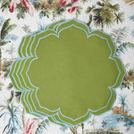 green essence placemats stacked olive green with blue scalloped edge on tropical palm botanical tablecloth