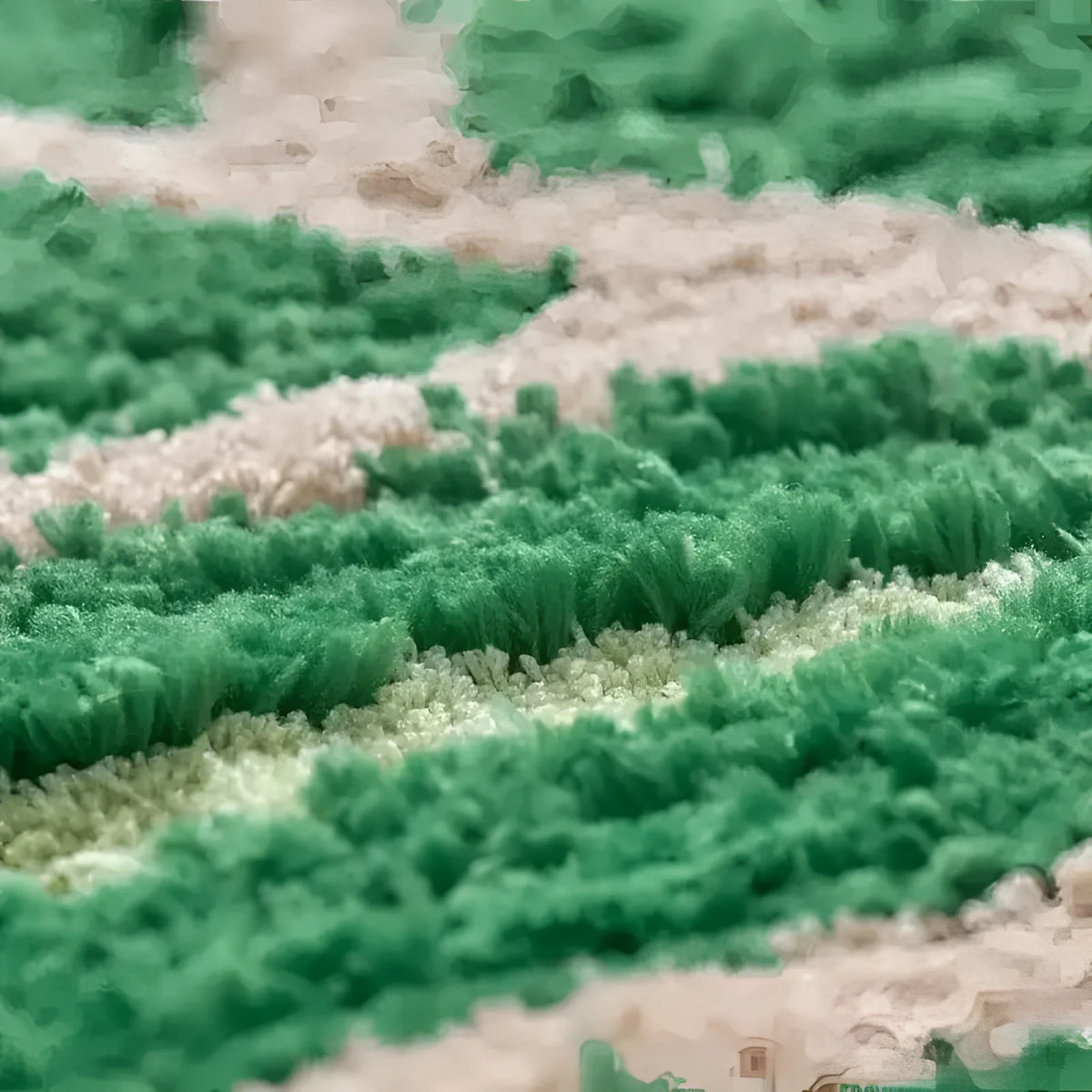 Close-up of a green leaf decorative bathroom mat, highlighting its plush texture and vibrant green and beige design, ideal as a runner rug for kitchens, hallways, or bathrooms.