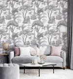 Grey Forest Serenity Wallpaper behind a grey sofa with pink and white cushions