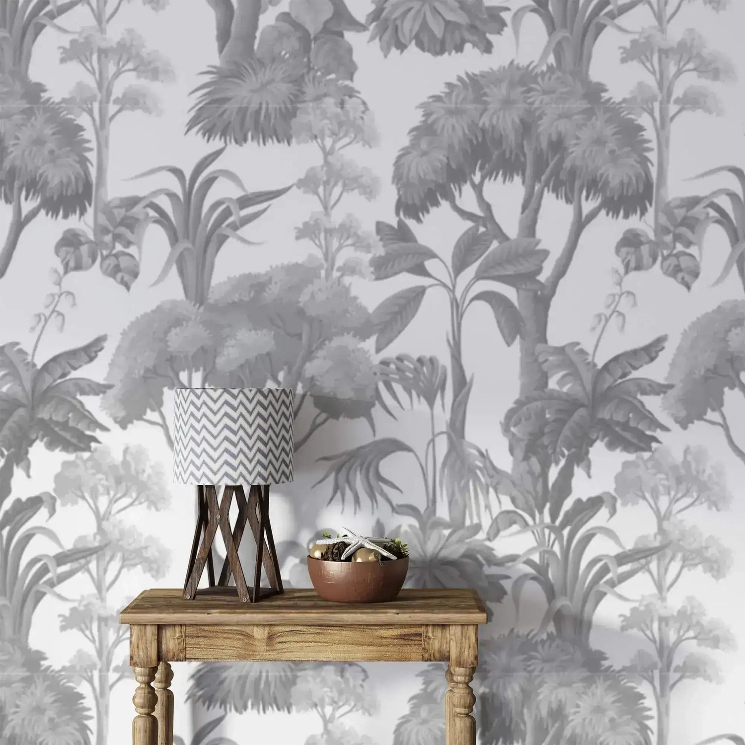 Grey Forest Serenity Wallpaper of soft toile trees behind a wood table with lamp and bowl