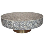 Grey spider bone inlay coffee table, round low form with grey and cream geometric star lattice, brass pedestal base