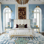 Stylish bedroom featuring a Hamsa Hand Magic Eye wool rug, perfect as an area rug in a dining room setting. The elegant geometric pattern complements the luxurious decor, showcasing its versatility as a dining room carpet.