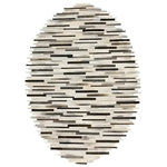 A stylish handmade irregular oval cowhide area rug, featuring a unique pattern of varying shades of brown and beige stripes. This 8x10 rug is perfect for enhancing the aesthetics of your living room, adding a modern and elegant touch to any space.