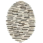 Top view of a handmade irregular oval cowhide area rug with an abstract pattern in neutral tones, perfect for adding a modern touch to your living room. Ideal choice for rugs for living room in 8x10 size.