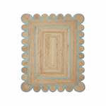 Beige and blue braided rug with scalloped edge on a white background