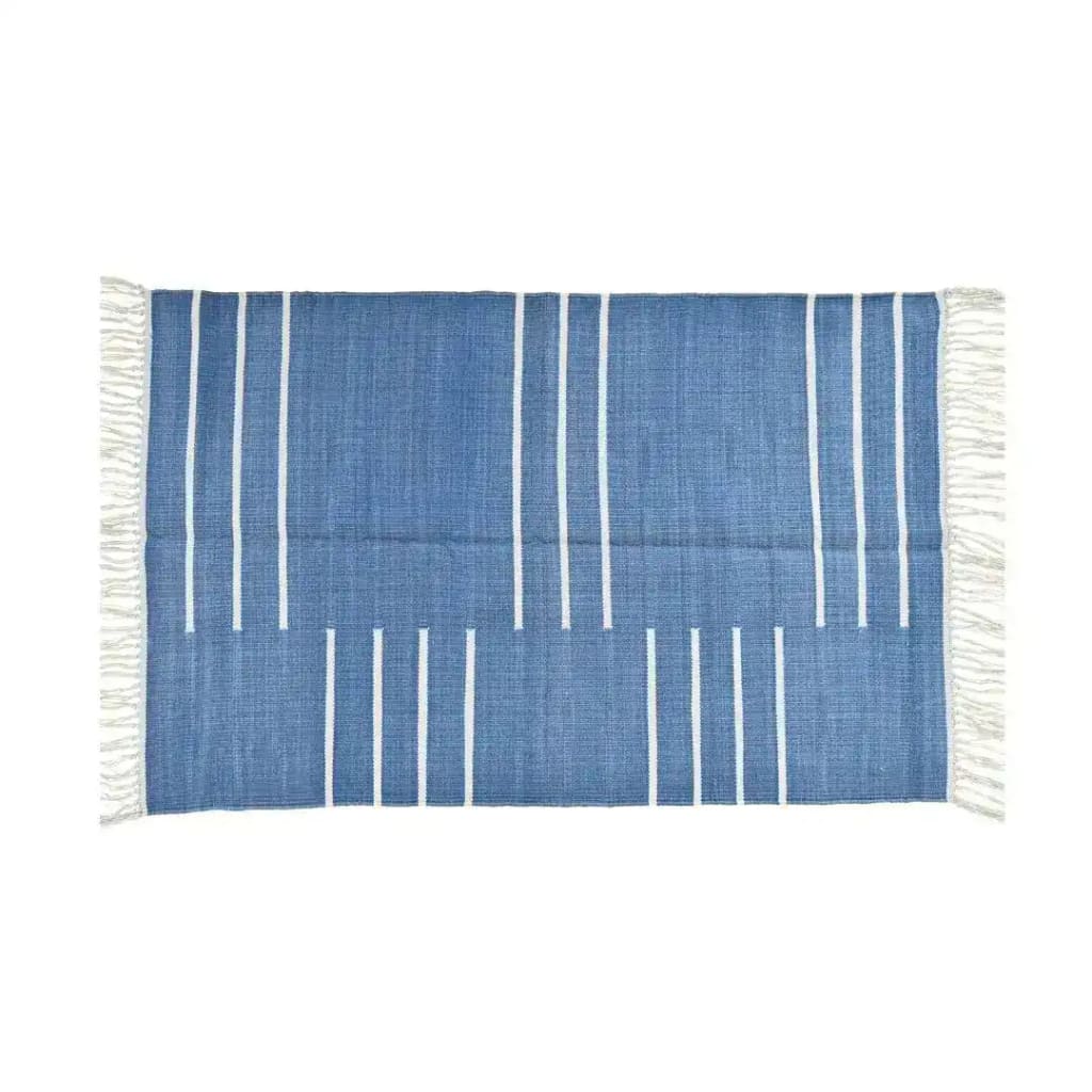 Handwoven blue and white minimalist cotton area rug with fringe detailing, perfect for adding a boho touch to your living room. This 8x10 rug features a simple yet elegant design, ideal for enhancing any space.