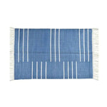 Handwoven blue and white minimalist cotton area rug with fringe detailing, perfect for adding a boho touch to your living room. This 8x10 rug features a simple yet elegant design, ideal for enhancing any space.