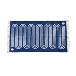Handwoven blue and white cotton area rug with a snake-inspired pattern and fringes, perfect for adding a boho touch to your living room or bedroom decor.
