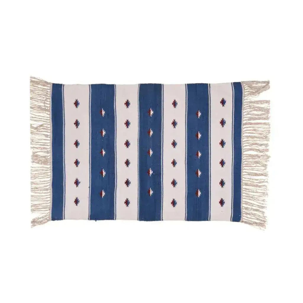 Handwoven blue and white stripe cotton area rug with fringes, perfect for adding a boho touch to dining rooms and living spaces. Ideal as a dining room area rug or under a dining table in a cozy living room setting.